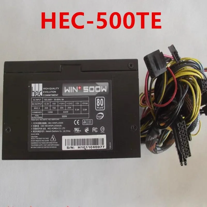 Silver ATX power supply unit with fan grille and cable bundle