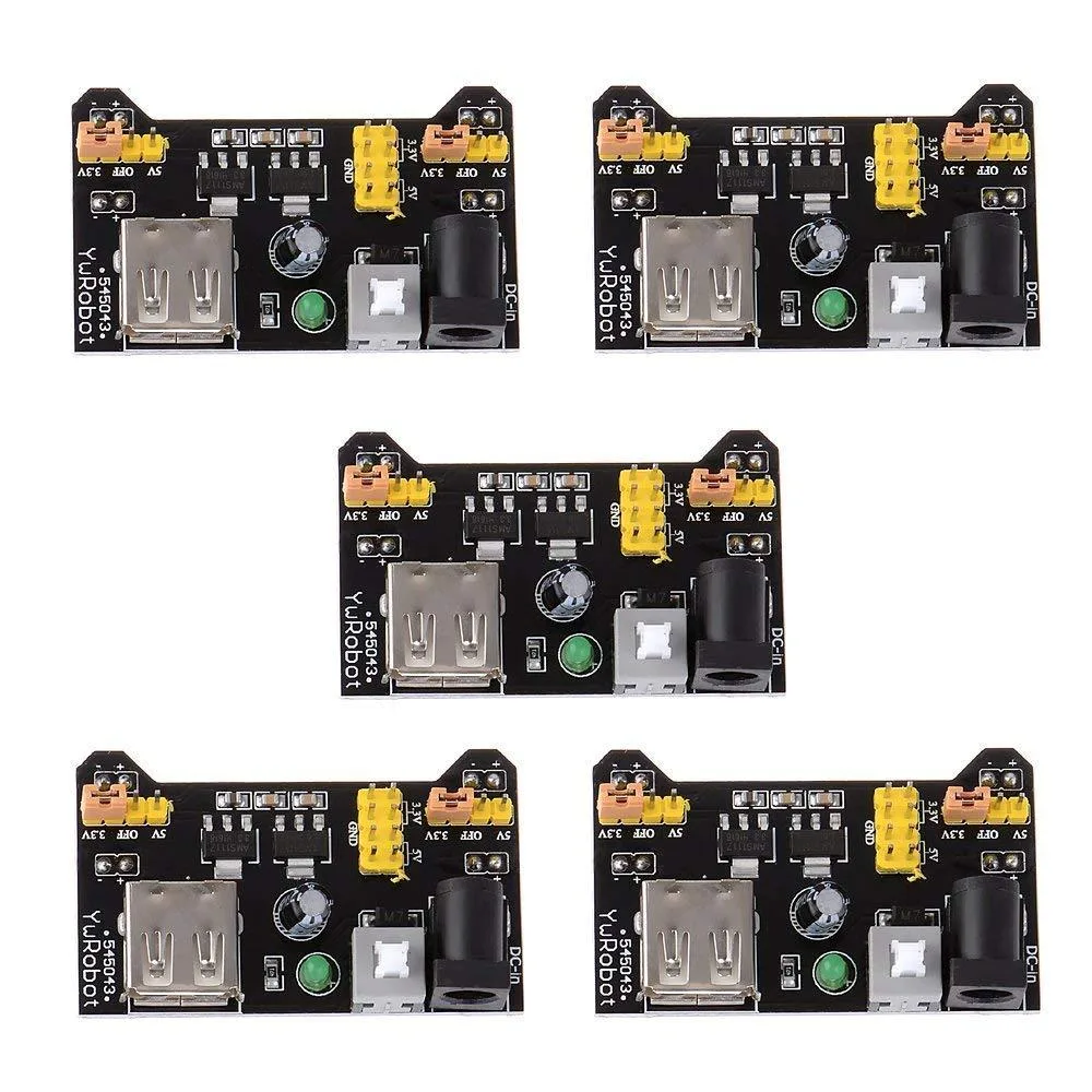Five black rectangular power modules with pin headers and USB ports