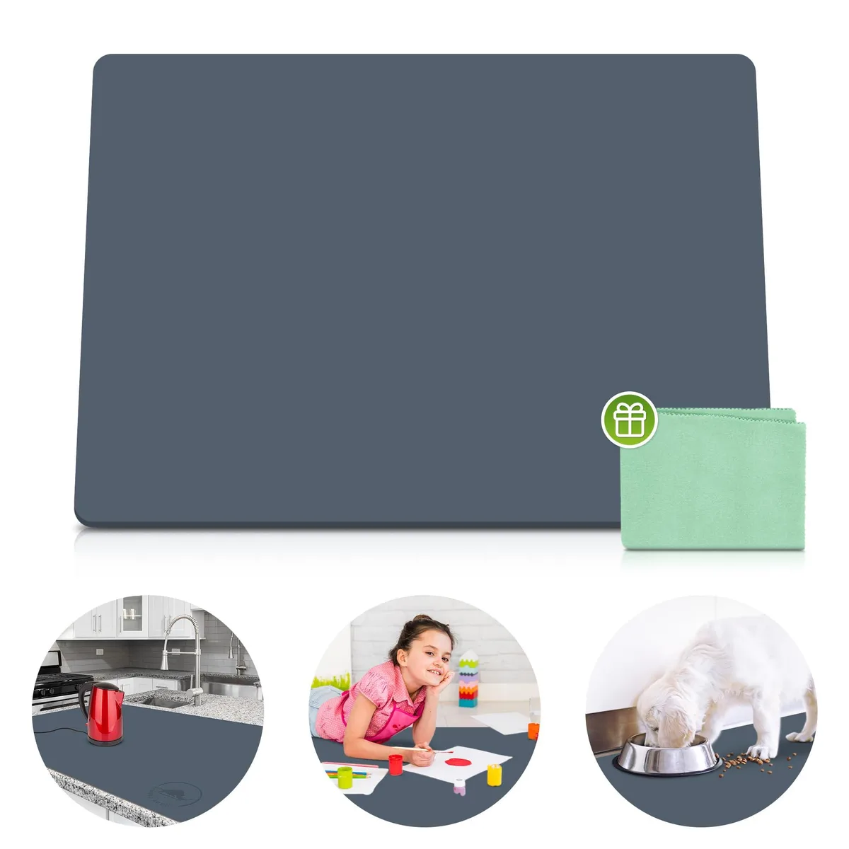 Grey rectangular silicone mat with textured surface and folded cleaning cloth beside it