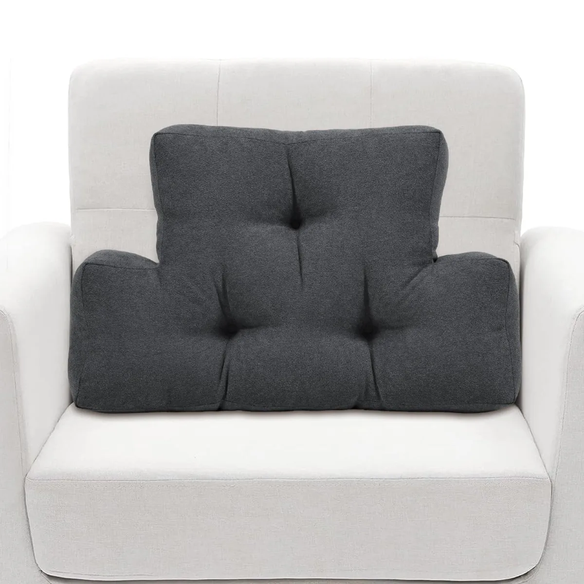 Grey lumbar support pillow, rectangular with rounded edges, soft plush cover with tufted stitching