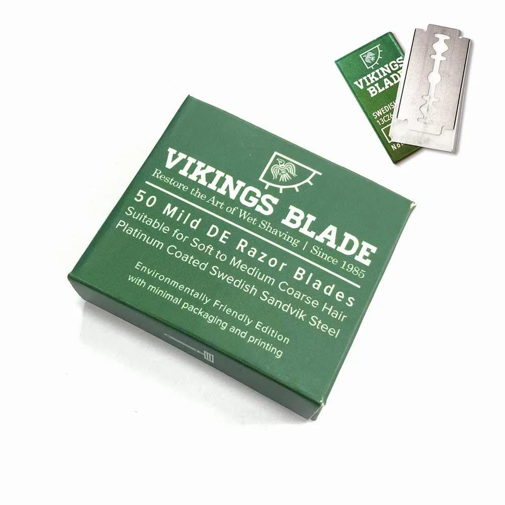 Cardboard dispenser holding fifty double-edge safety razor blades in individual waxed paper wrappers