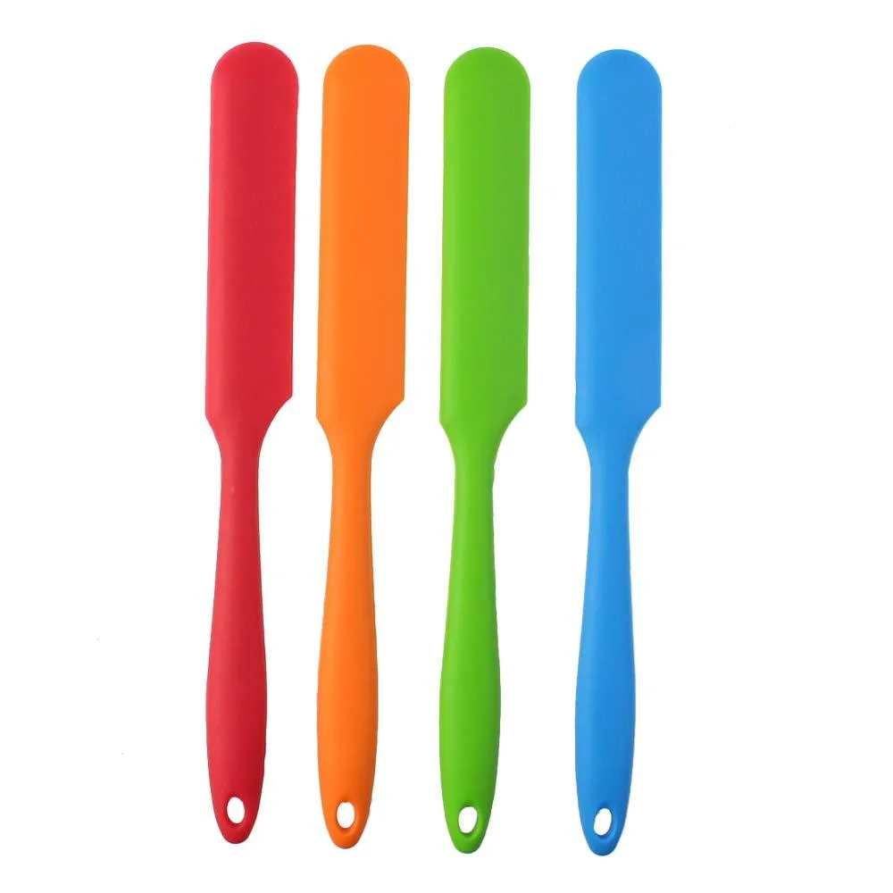 Four multicolour silicone spatulas with ergonomic handles and hanging holes