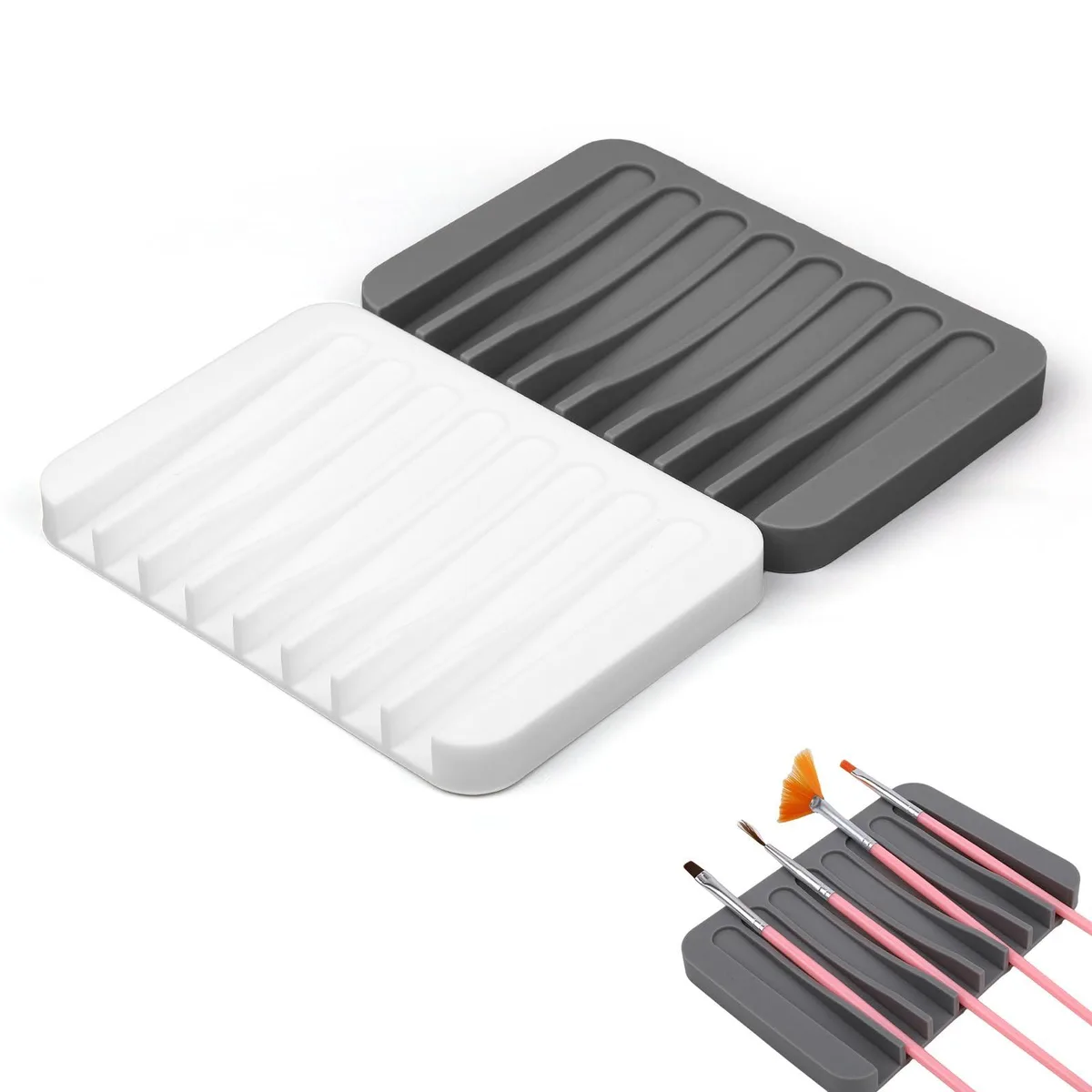 Two gray and white silicone brush holders with eight slots each