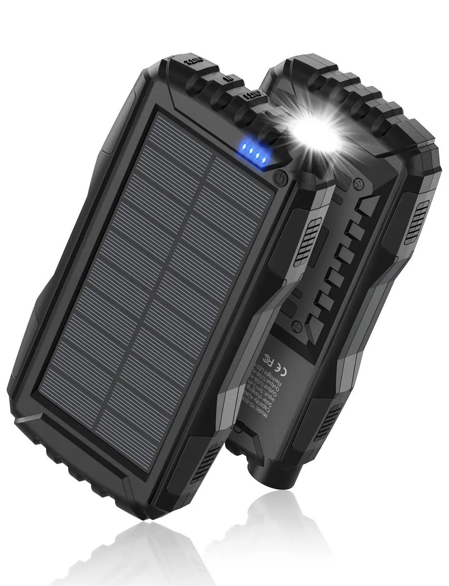 Black rectangular solar power bank with USB-C ports and built-in flashlight