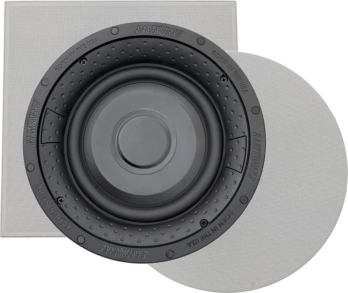 White square in-wall subwoofer with magnetic grille visible