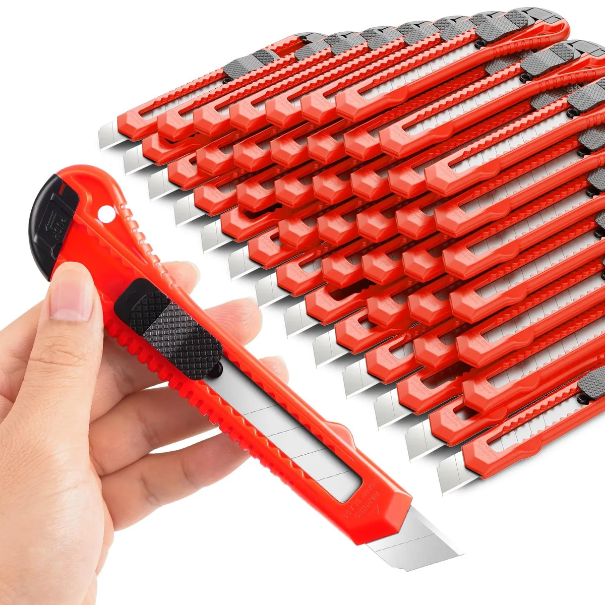 Thirty red retractable utility knives with 18mm snap-off blades in a bulk pack