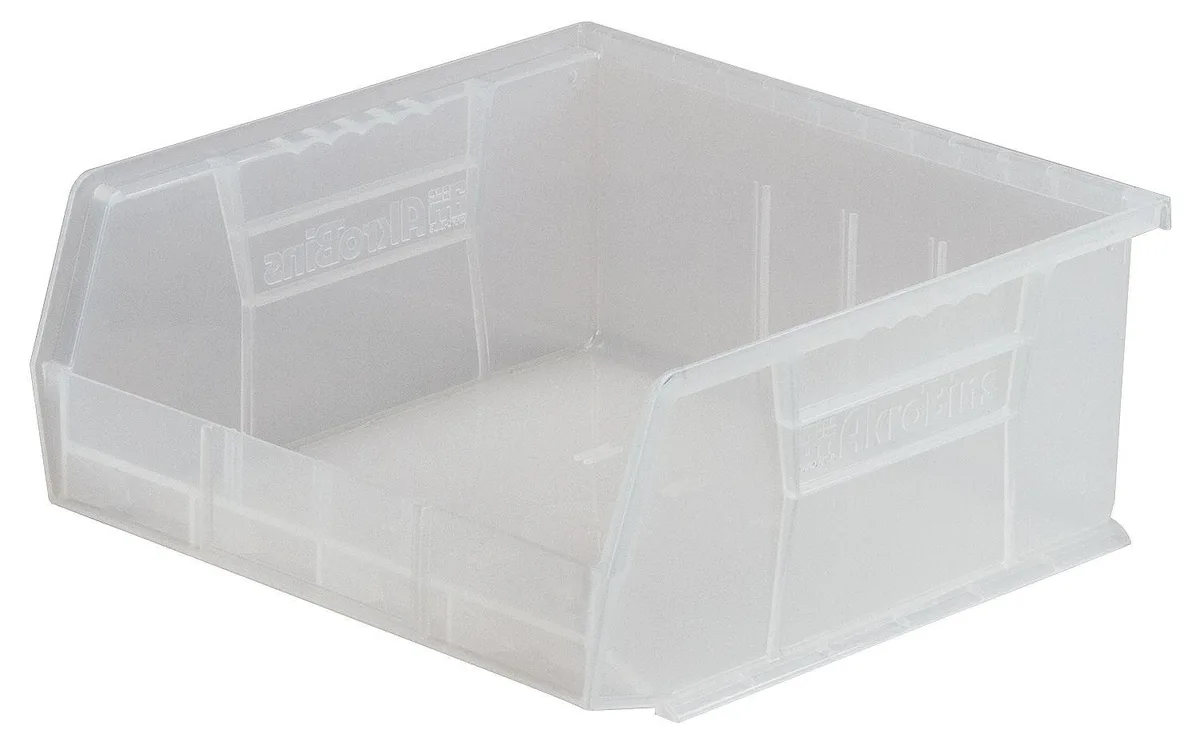 Clear plastic storage bin with open front and molded hanging lip