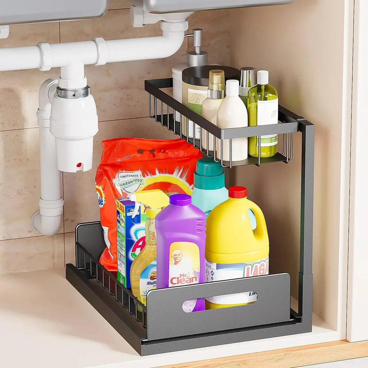 Black L-shaped under-sink organizer with two sliding wire tiers and ergonomic handles