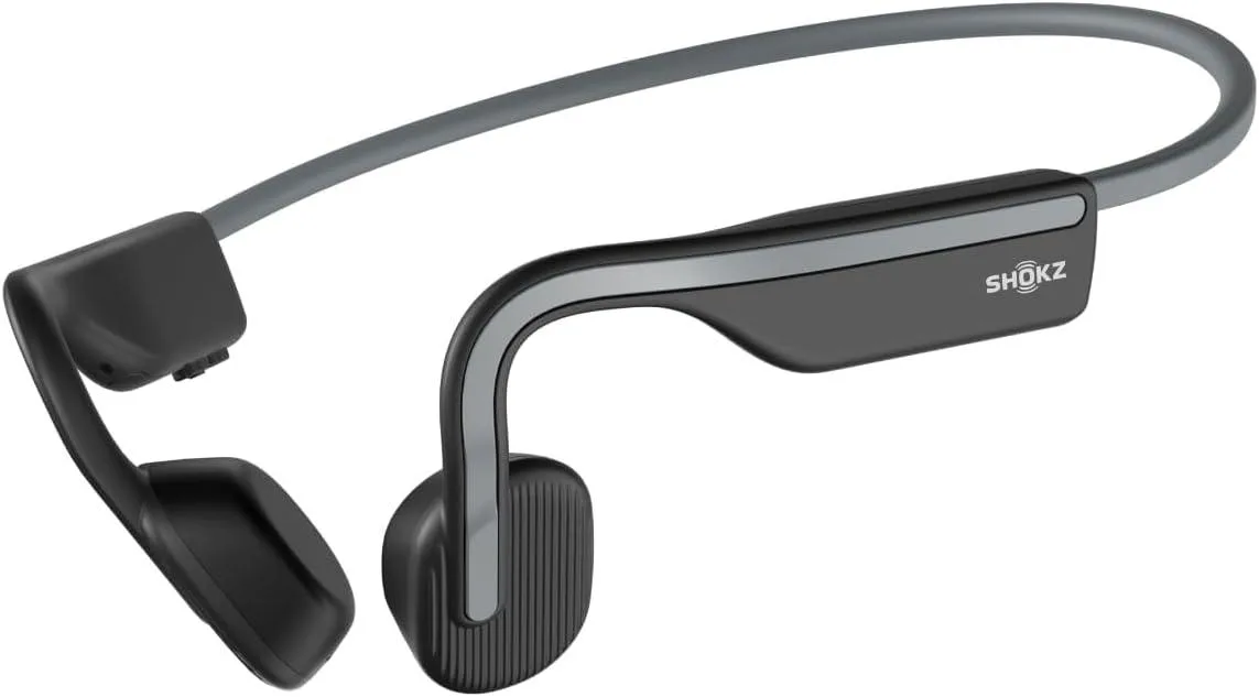 Grey open-ear bone conduction headphones with wraparound titanium frame