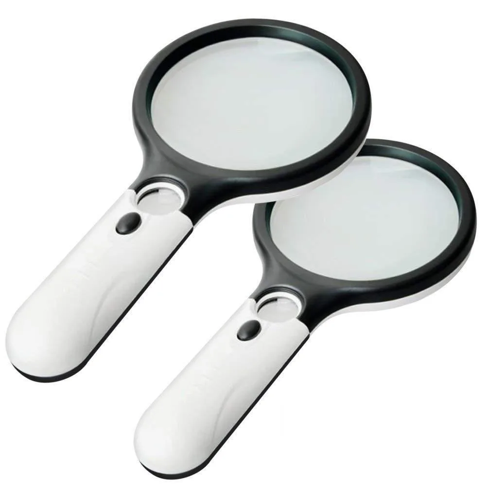 Two white and black handheld magnifiers with ergonomic handles and LED lights