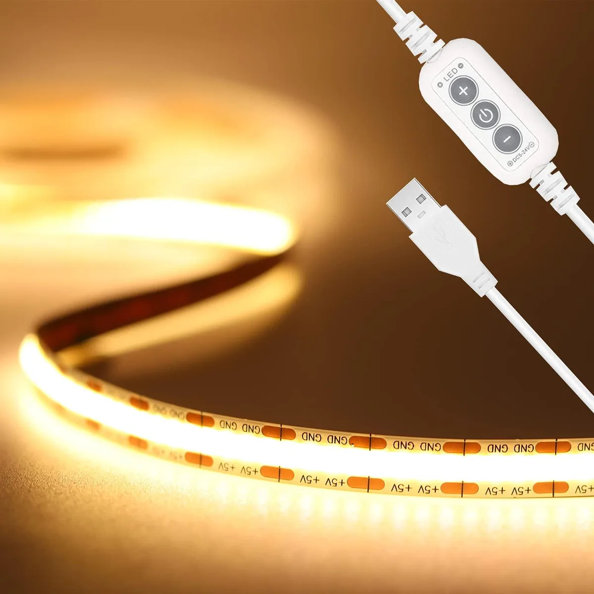 A flexible 6.56ft warm white COB LED strip on a reel with 3M adhesive backing and USB power cable