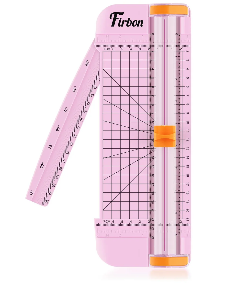 Pink A5 paper trimmer with spring-loaded blade, side ruler and angle scale