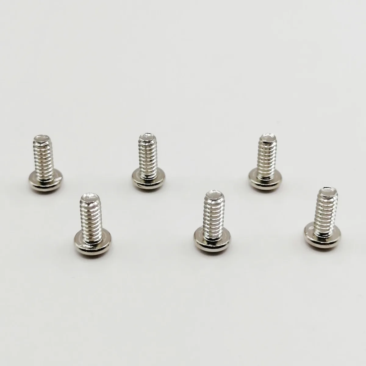 Six silver hinge screw assemblies for clippers