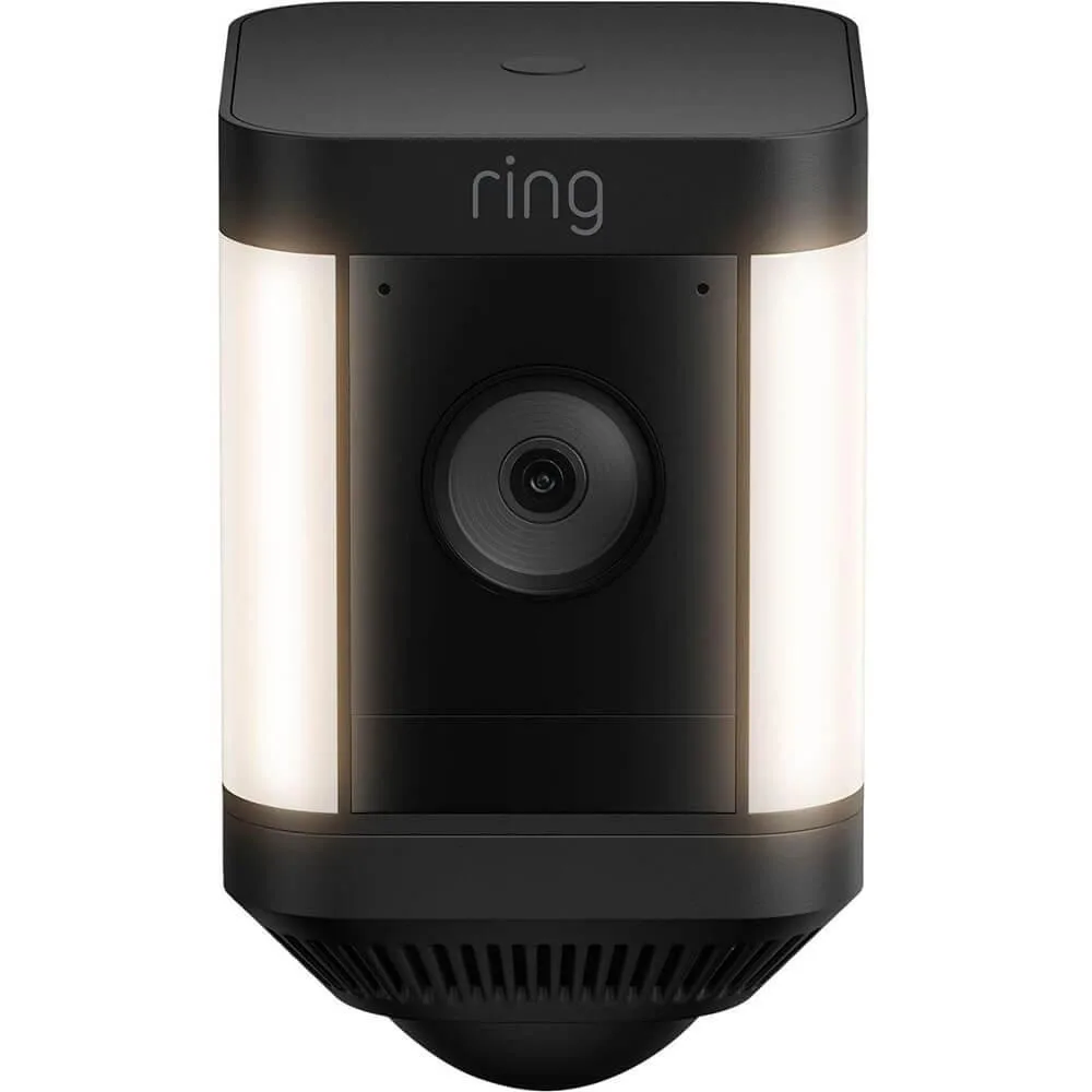 Black rectangular outdoor camera with integrated LED spotlights and rechargeable battery pack