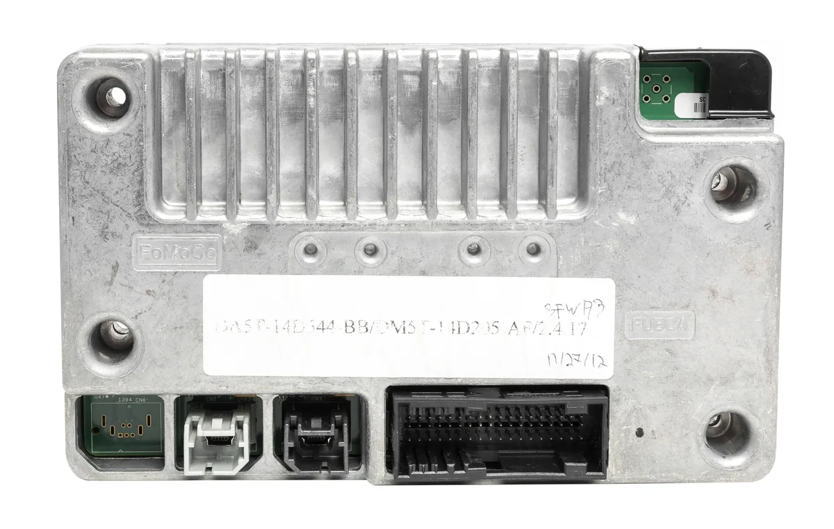 Small black rectangular electronic module with connector ports
