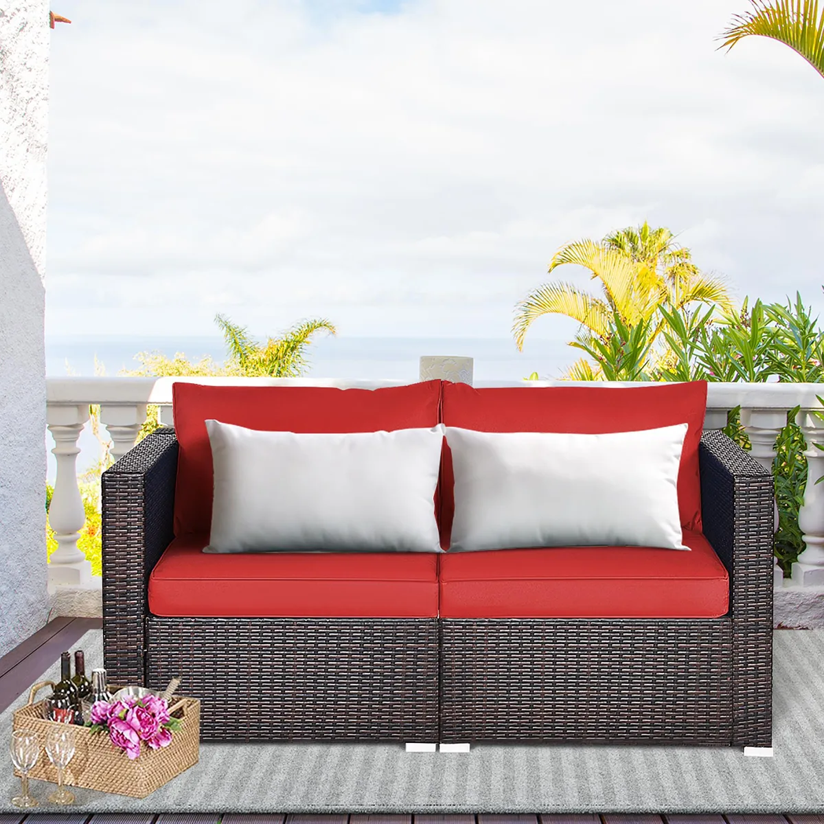 Two-piece rattan corner sofa set with red cushions, powder-coated steel frame, hand-woven PE rattan, aluminum foot pads