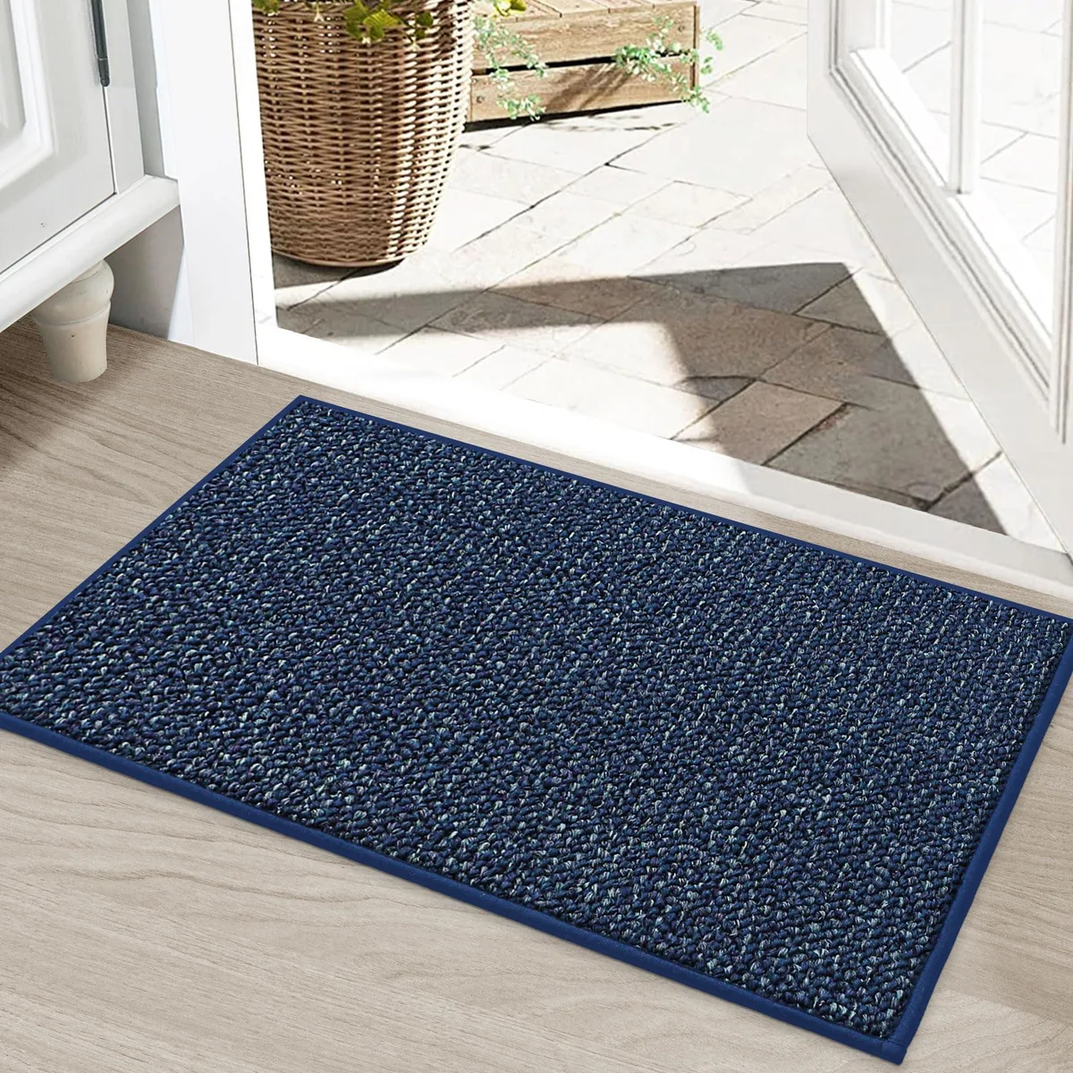Blue rectangular door mat 20 by 32 inches with low profile .4 inch thickness
