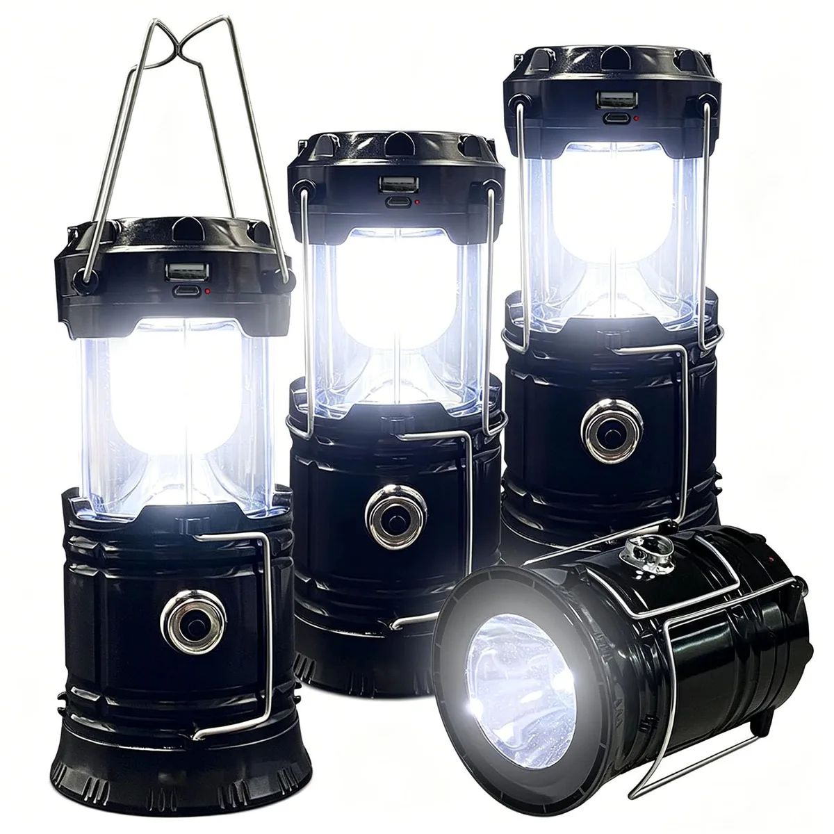 Four black collapsible LED lanterns with folding handles, shown closed and open