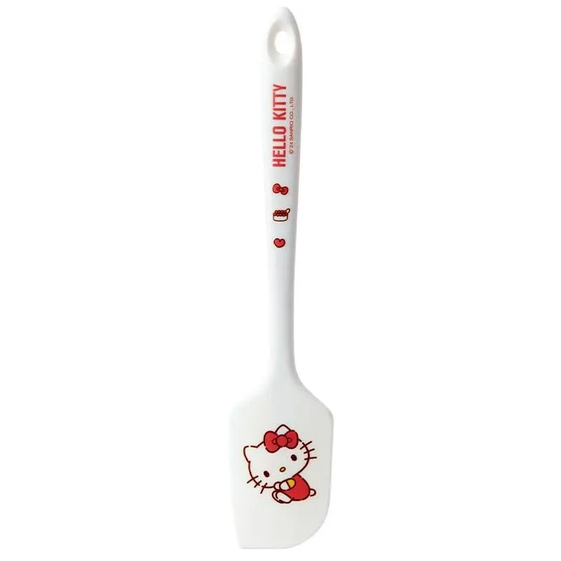 Two white silicone spatulas with long narrow heads and hanging holes