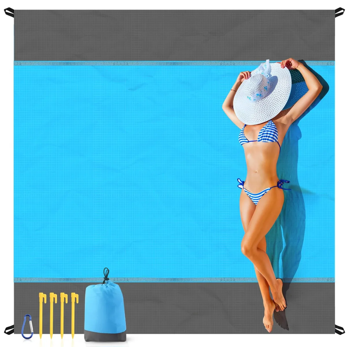 Oversized 79 by 83 inch sandproof polyester beach blanket with stakes and carry bag