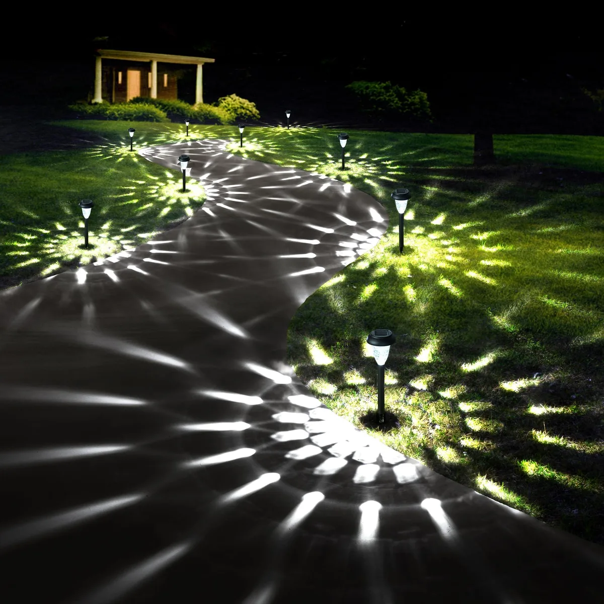 Twelve white plastic stake lights with solar panels and cool white LEDs