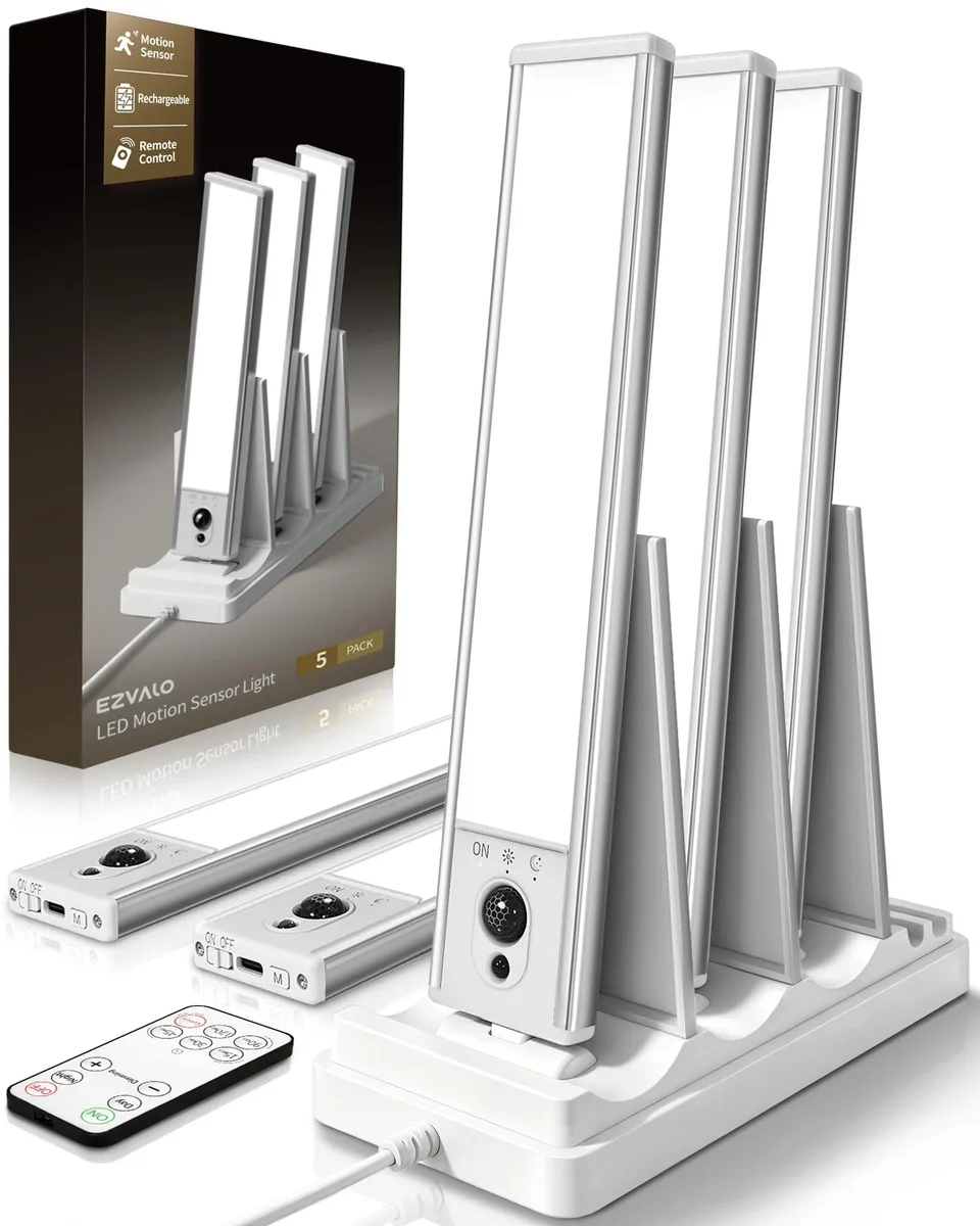 Five white rectangular LED bars with a matching three-slot charging dock and remote control