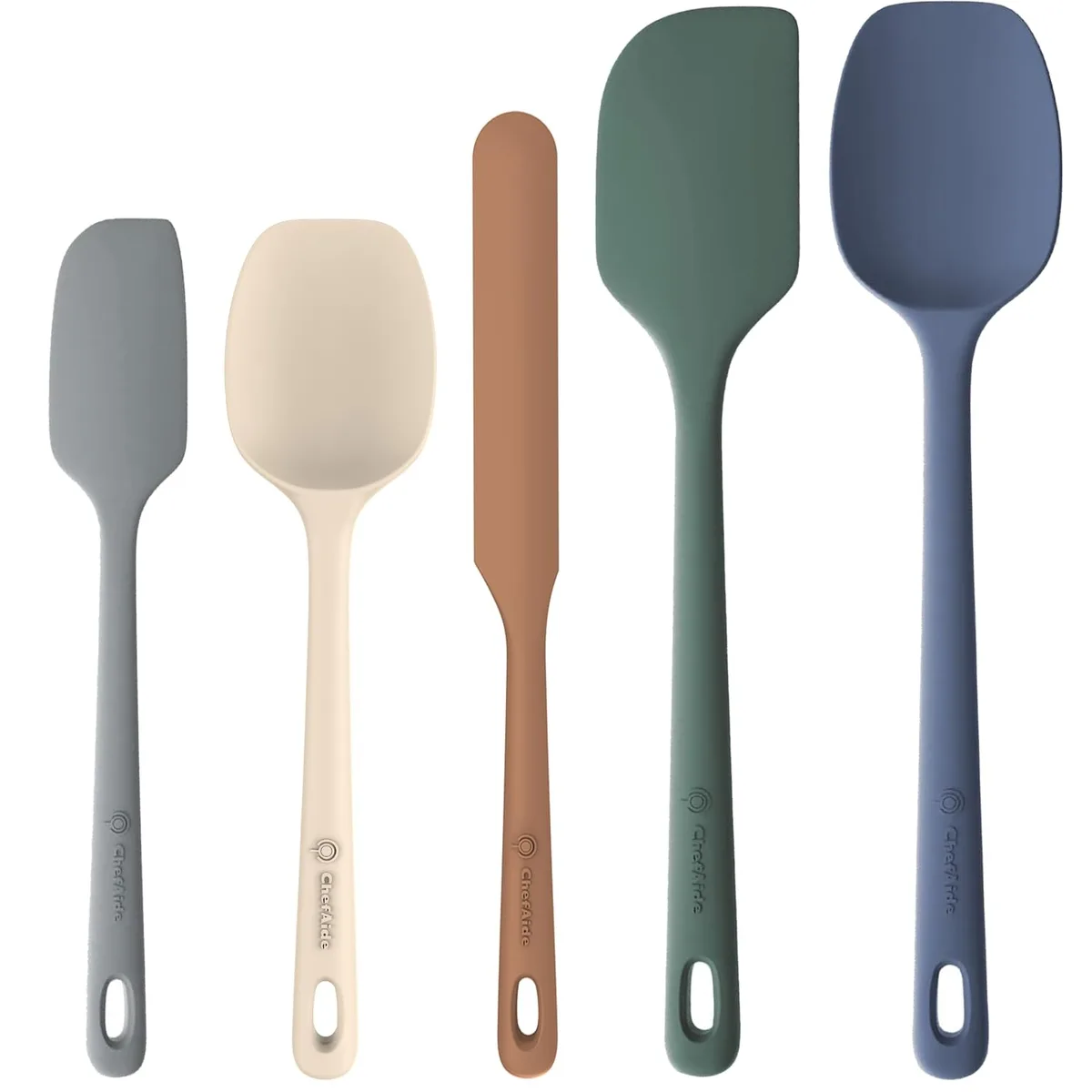 Five neutral grey silicone spatulas with ergonomic handles and hanging loops