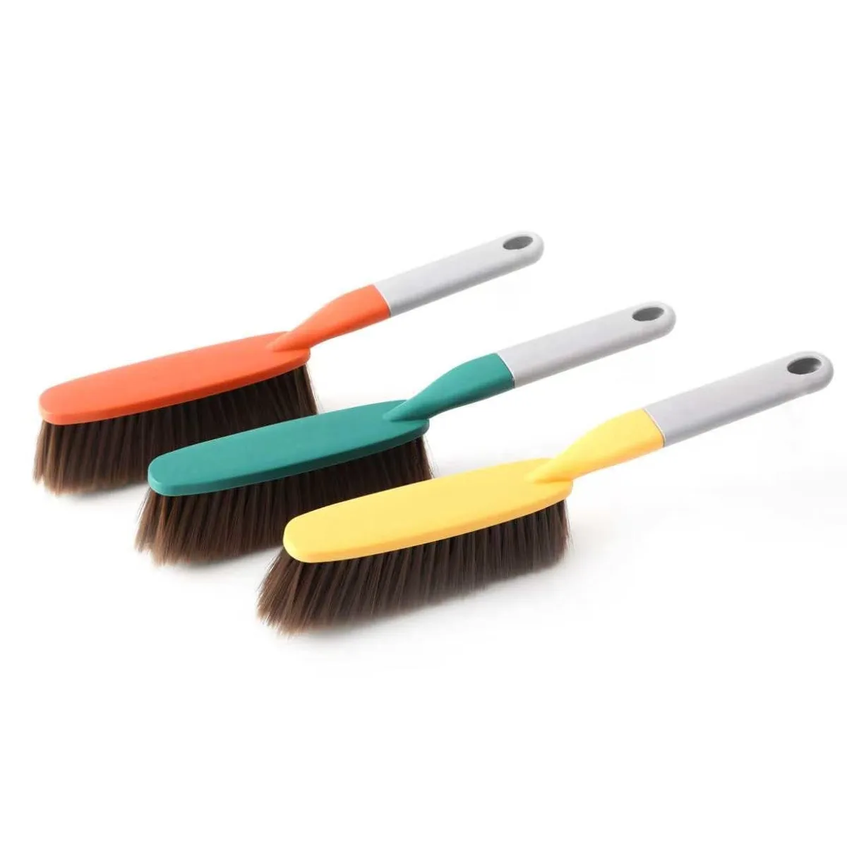 Three hand brooms, green yellow orange, plastic handles, soft bristles, 15.7 inches long