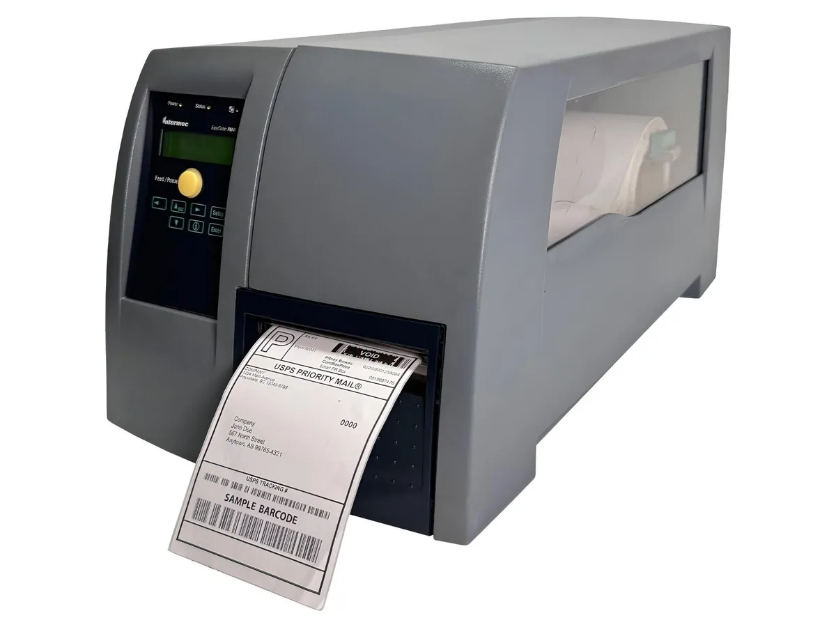 Intermec EasyCoder PM4i industrial RFID label printer, dark grey cabinet, front media window, LAN and USB ports visible