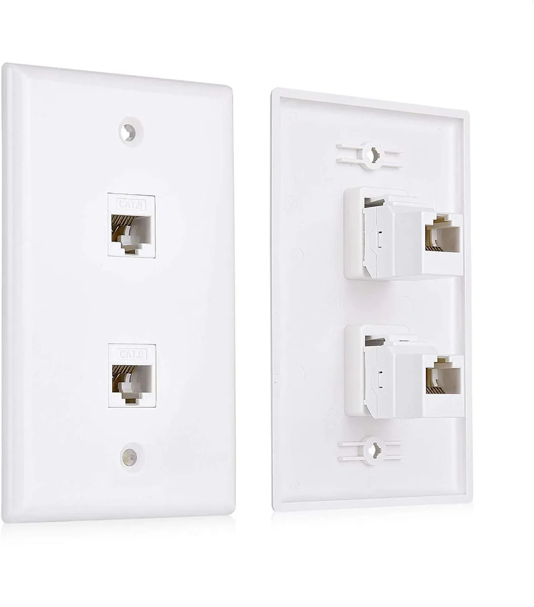 Two white single-gang wall plates each with two RJ45 keystone jacks and matching screws