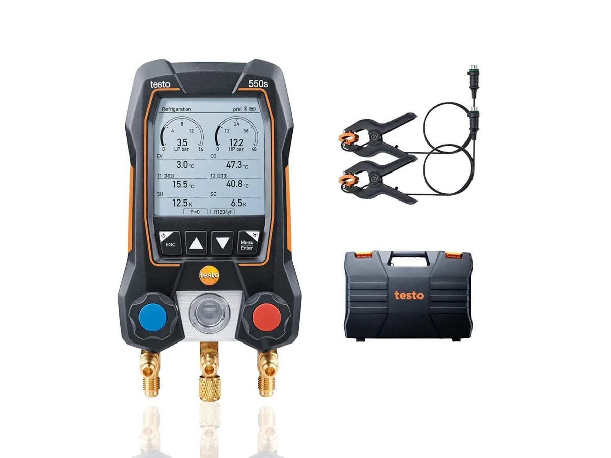Yellow digital manifold gauge with two wired clamp probes attached
