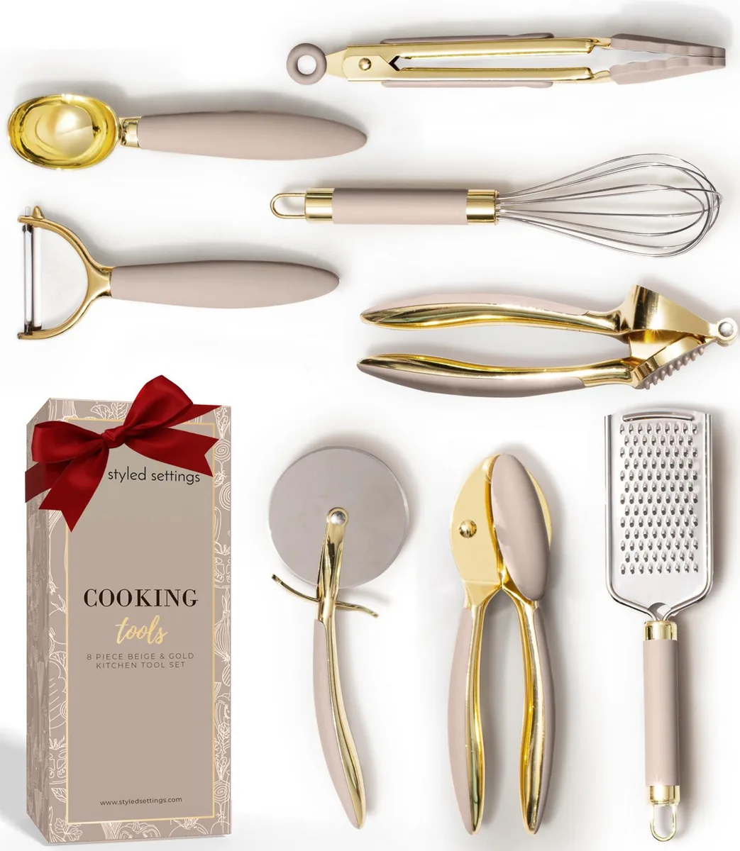 Eight-piece beige silicone kitchen utensil set with gold metal accents