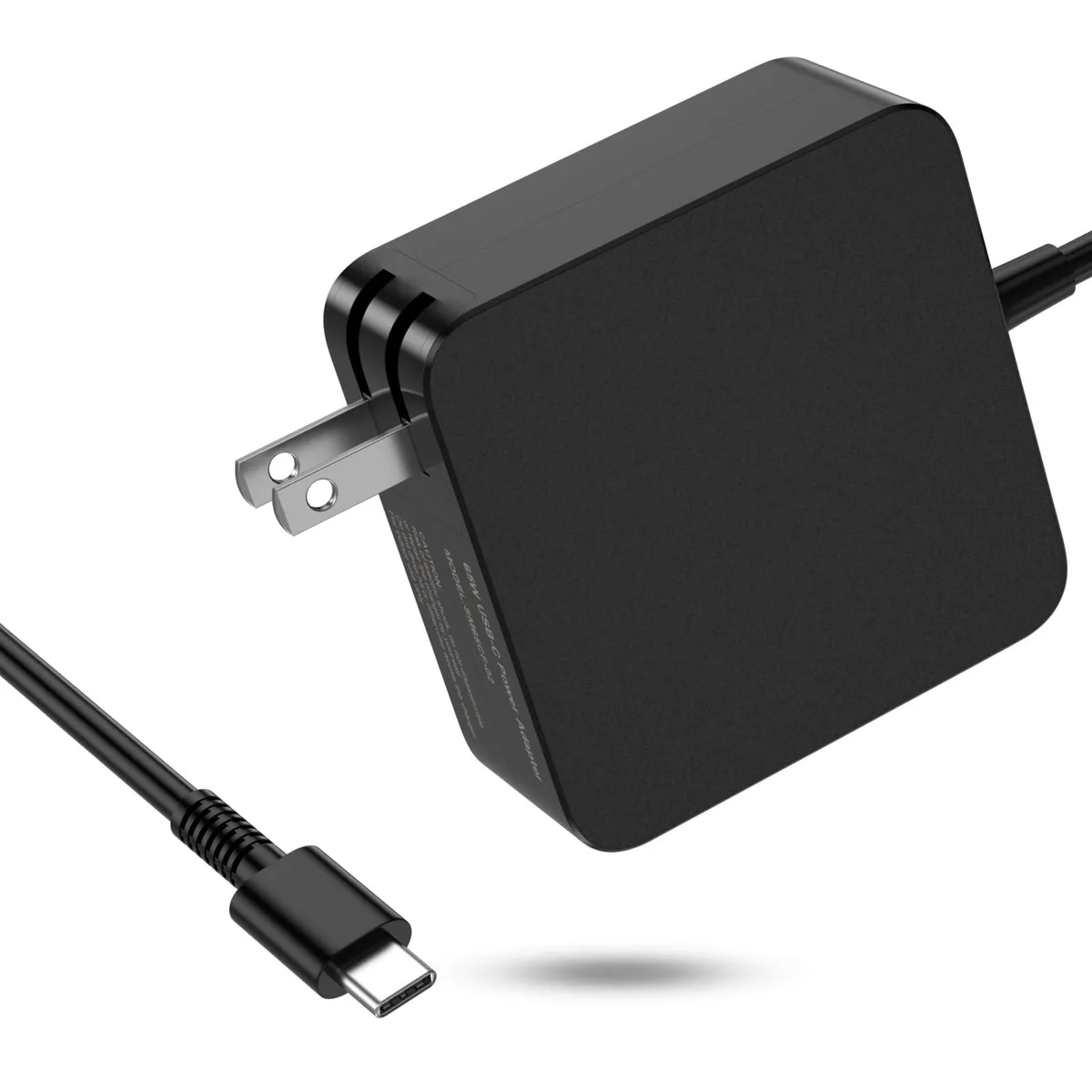 Compact 65W USB-C laptop charger with foldable plug and detachable power cord