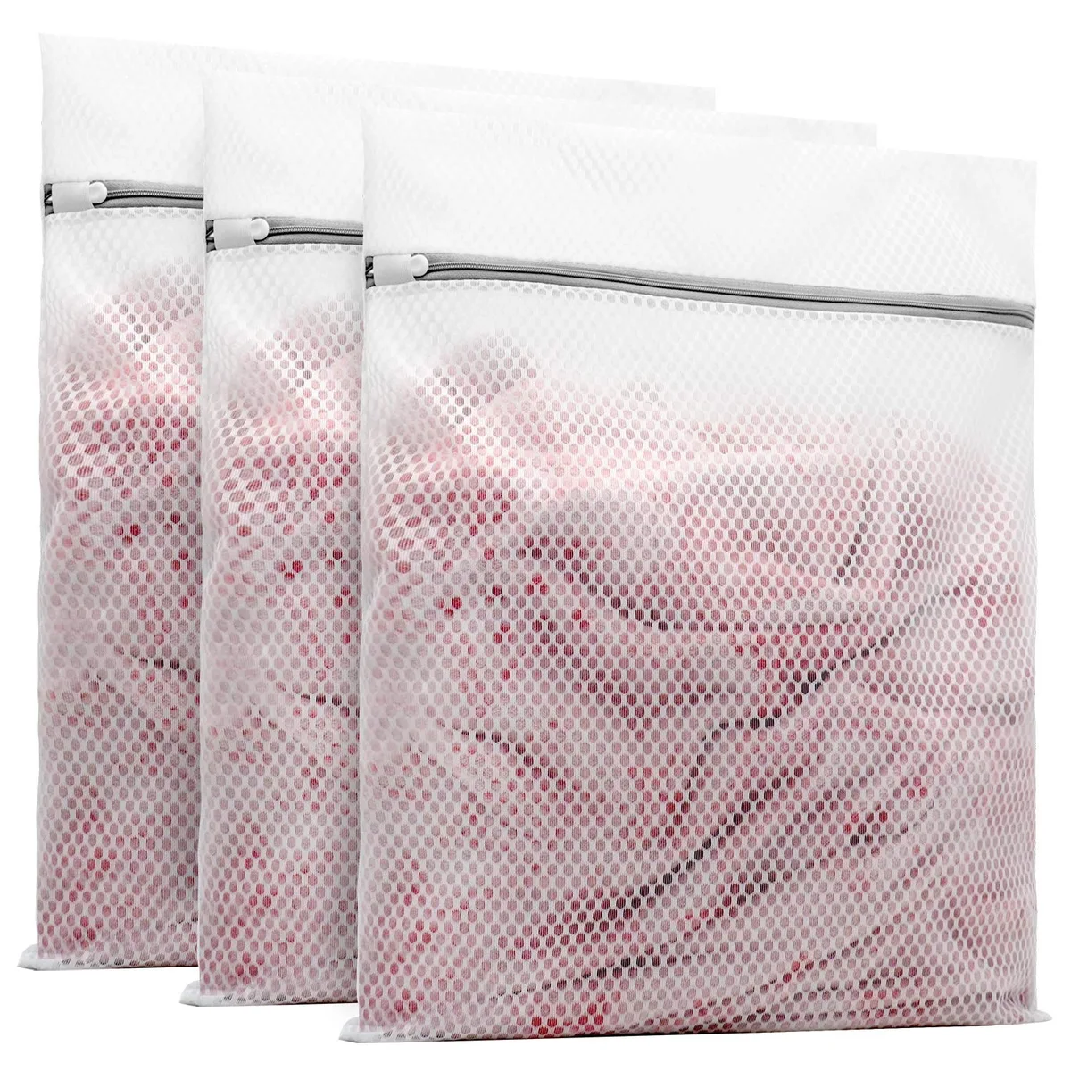 Three beige honeycomb mesh bags with zippers, rectangular 16 by 20 inches