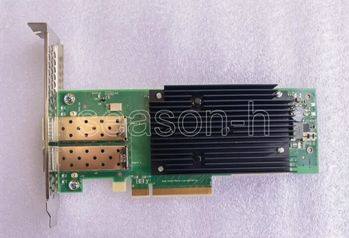 Green circuit board with two silver SFP28 ports and a gold PCIe edge connector