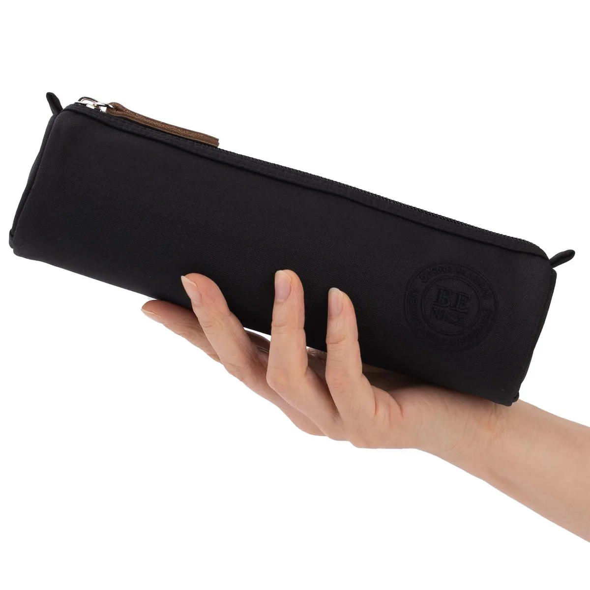 Black cylindrical pencil case in polyester with zip closure, 9.25 by 2.56 inches