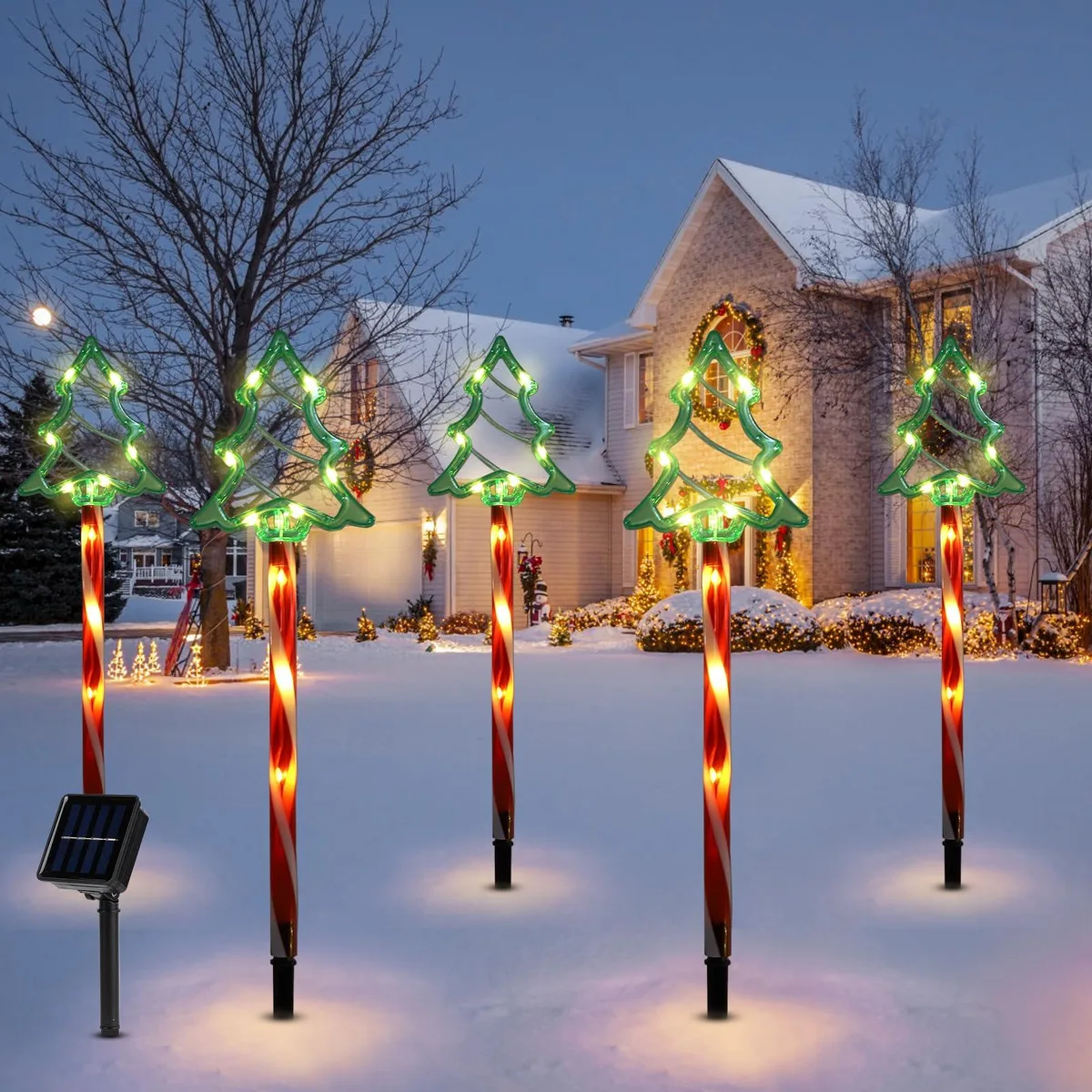 Green solar-powered Christmas tree stake lights with built-in LEDs
