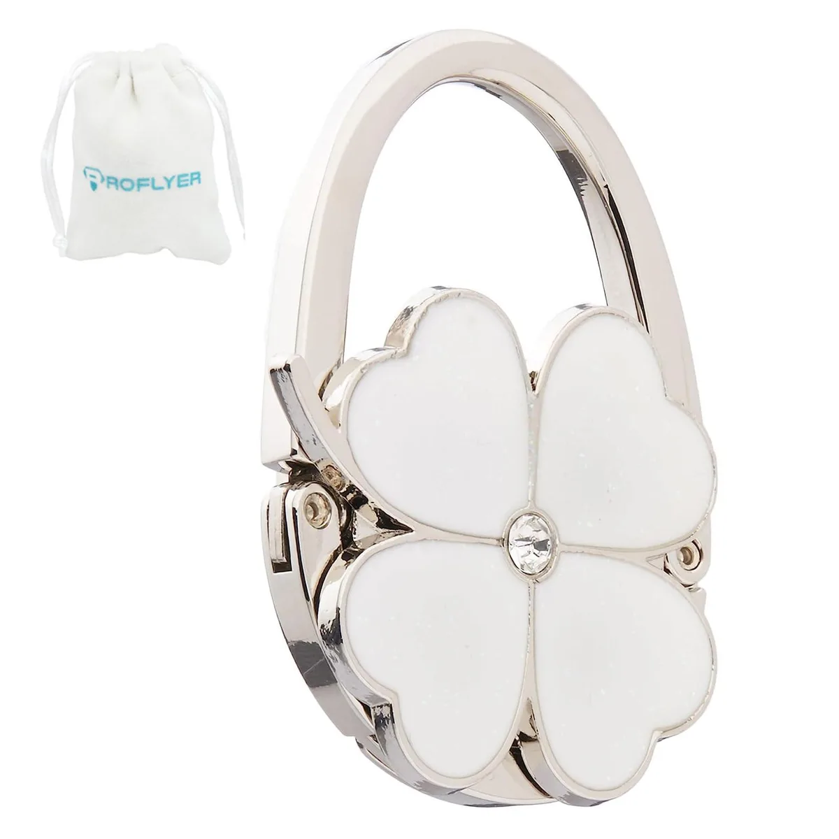 White foldable clover-shaped handbag hook with magnetic closure, shown folded with velvet pouch