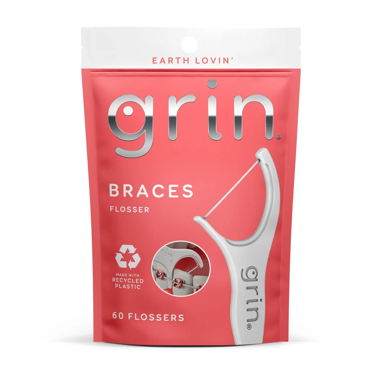 White plastic floss pick with thin floss and pick end