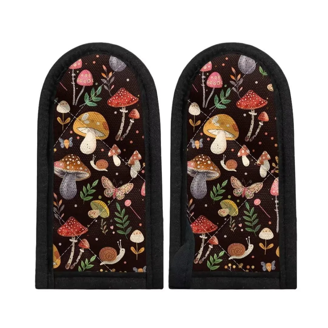 Two quilted floral fabric handle covers on a light surface