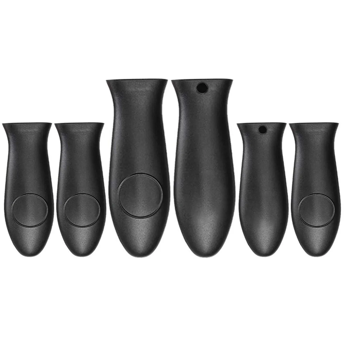 Six black silicone handle covers in two sizes laid flat