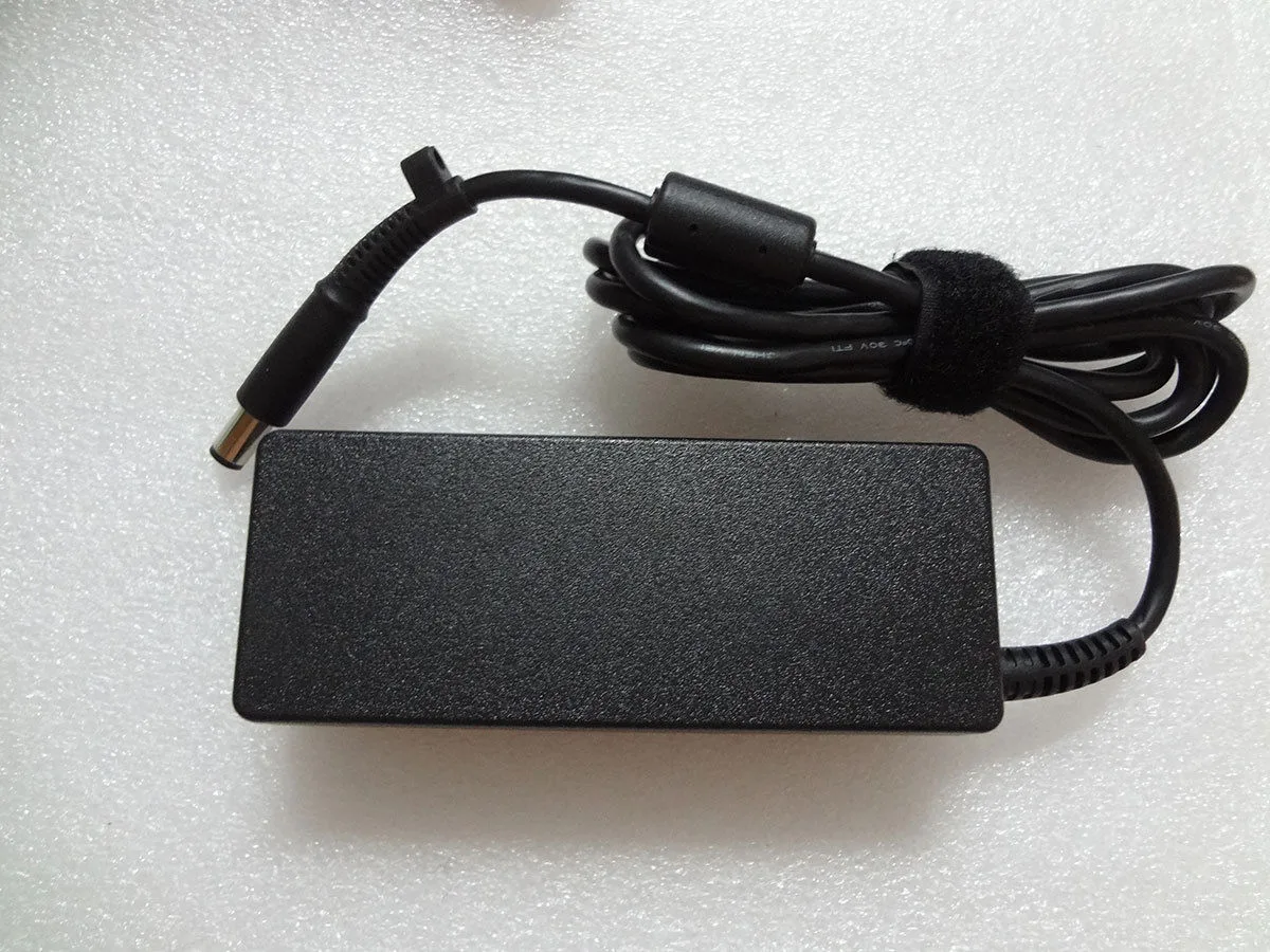 HP 608428-002 black rectangular power brick with cable