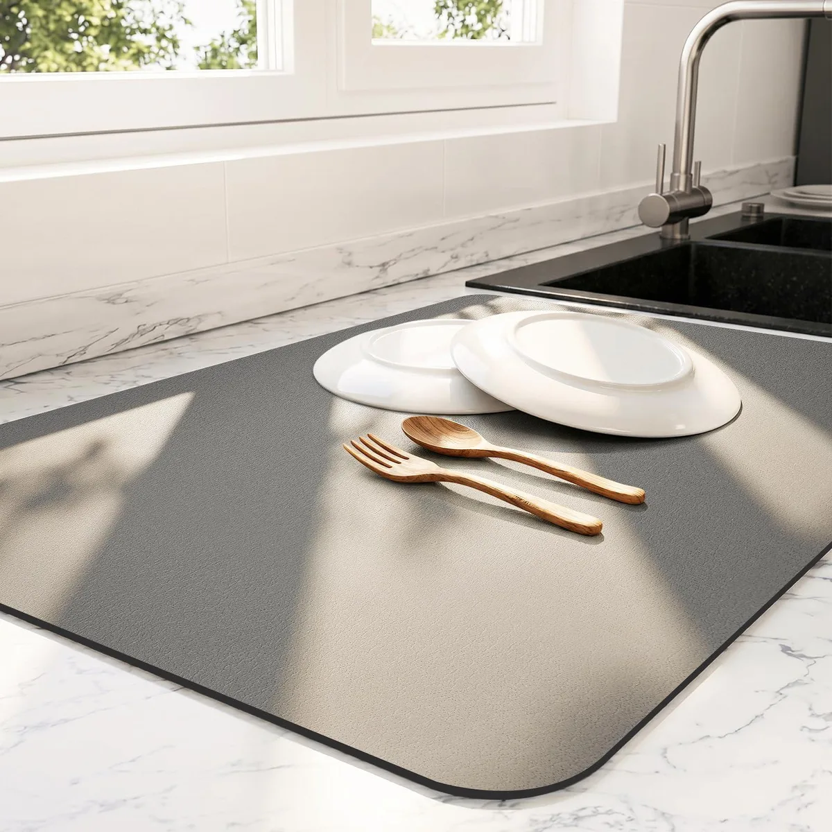 Dark grey rectangular kitchen mat measuring 16 by 18 inches with textured surface and rubber backing