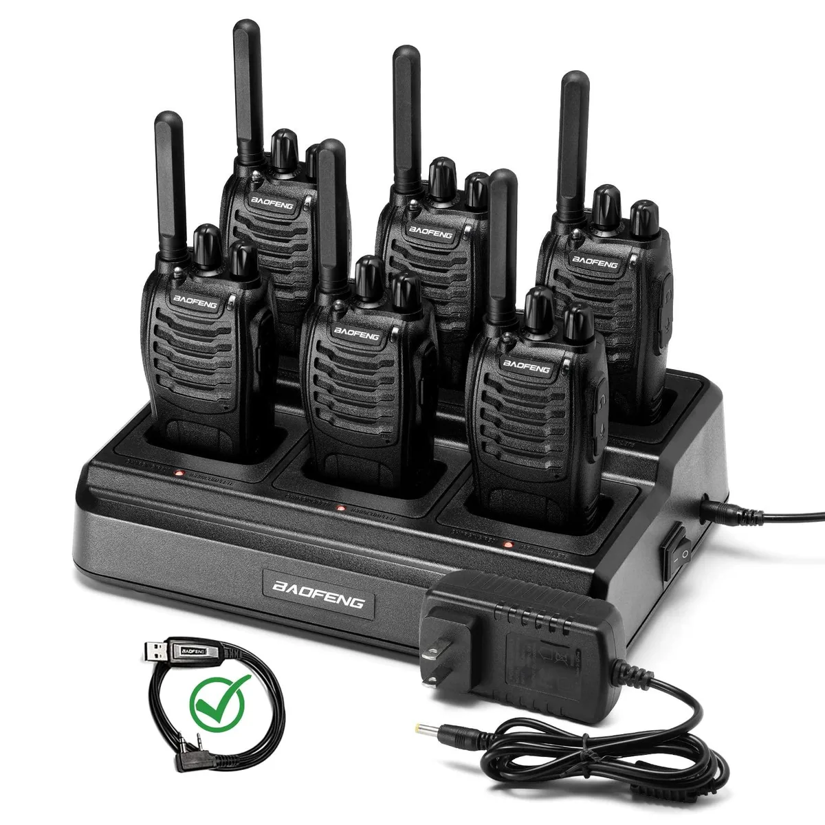 Six black two-way radios with fixed antennas and a six-bay charger base