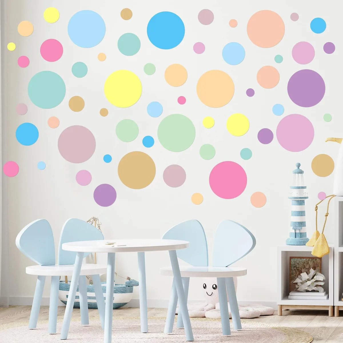 Twelve sheets of pastel vinyl polka dot stickers, 264 pieces in eight sizes