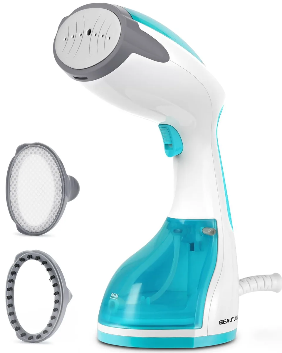 White handheld garment steamer with detachable water tank and brush attachments