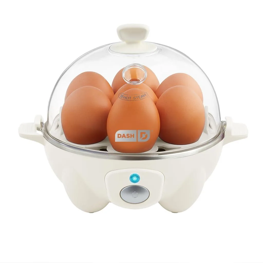 Cream-coloured compact egg cooker with clear lid and seven-egg tray