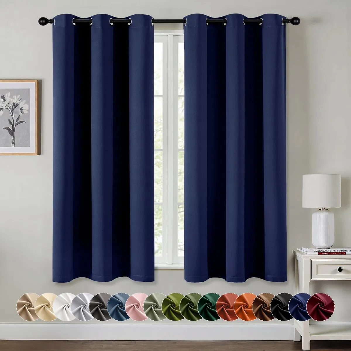 Two navy blue curtain panels with silver grommets, 40 by 63 inches each