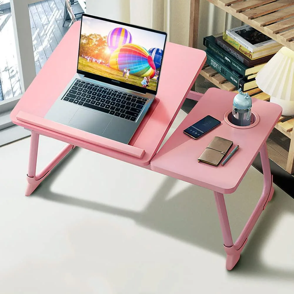 Pink foldable lap desk with adjustable tilt, cup holder and stoppers