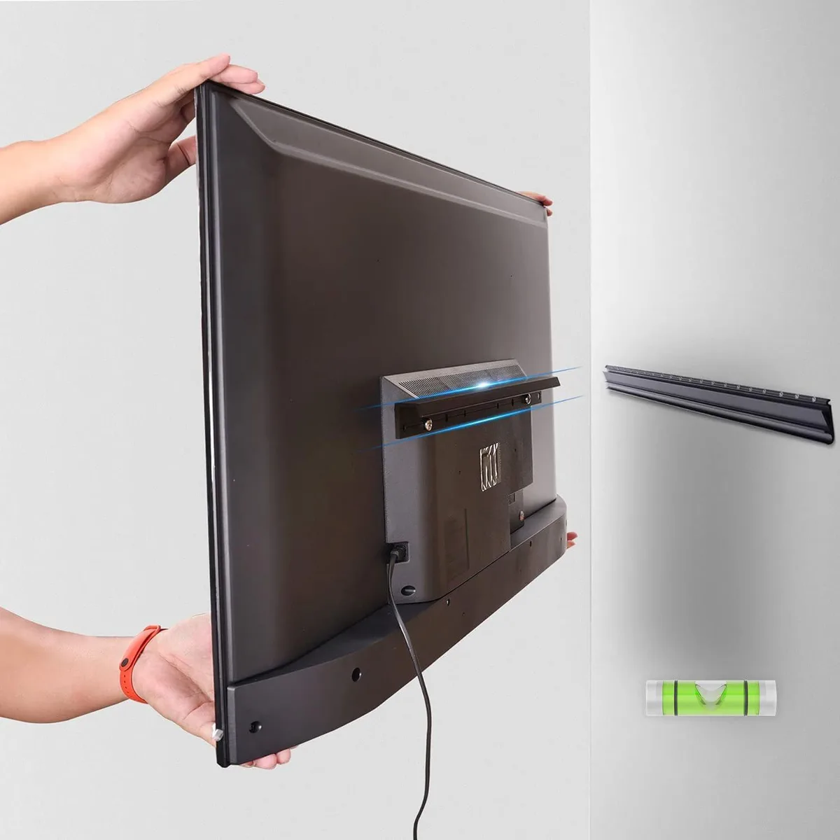 Black aluminium alloy wall bracket with TV mounting plate, security cable, bubble level and nails